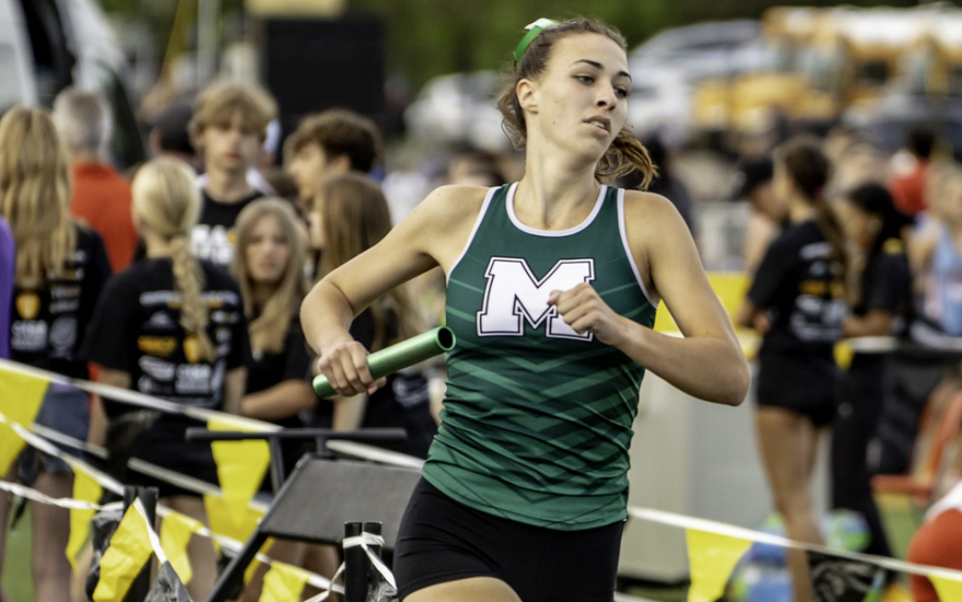 girl running with baton